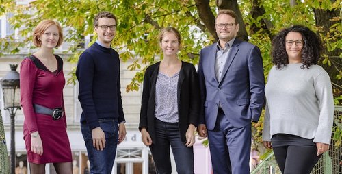 A group corporate portrait photo shot in Paris