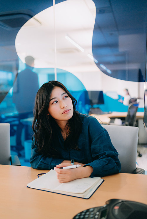 Business woman in a meeting.