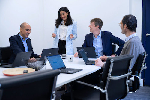 Picture of a team meeting.