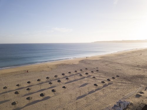 Arial photo shot by a drone of the beach in Meia Praia, Portugal, for a boutique-hotel built by MGB Development