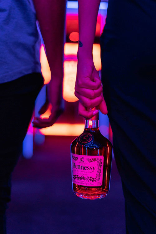 Photo shooting by a European photographer specialized in lifestyle photos and mastering the light effects for the Hennessy spirits brand.