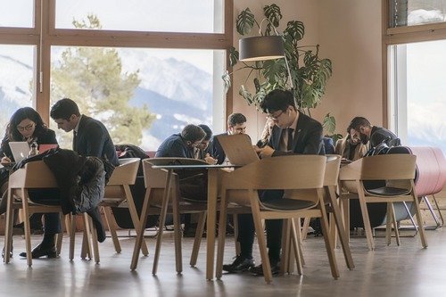 A group of students from Les Roches school are studying